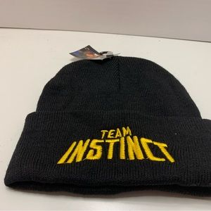 TEAM INSTINCT BLACK BENNIE HAT BLACK WITH YELLOW LETTERS
